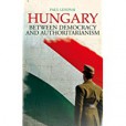 Hungary: Between Democracy and Authoritarianism Hungary: Between Democracy and Authoritarianism